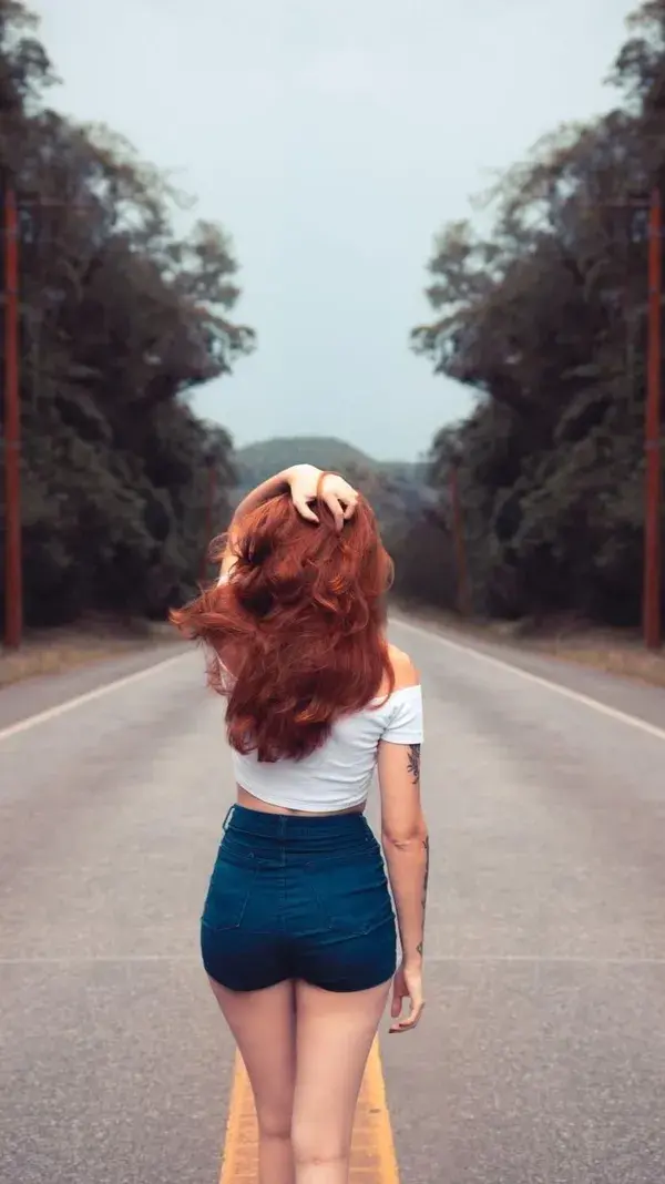 Woman Standing on Road