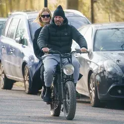 Jason Statham and Rosie Huntington-Whiteley look loved-up during ride on electric bike