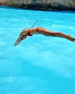 Diving into the blue water in Zákynthos, Zakinthos, Greece