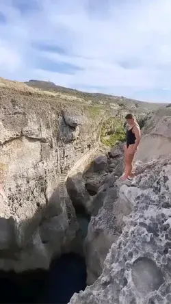 Would you dare to jump? 😱  🇲🇹 This cliff in Malta is an impressive 22 meters tall ⛰