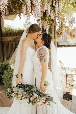 Mrs. and Mrs. -- Outdoor wedding, wedding dresses, bridal bouquets - Fantasy Bridal