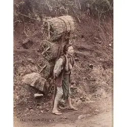 japan | woman carrying charcoal 1890s