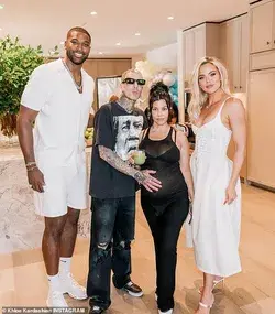 Kourtney Kardashian and Travis Barker look SMALL next to Khloe Kardashian and Tristan Thompson. S...