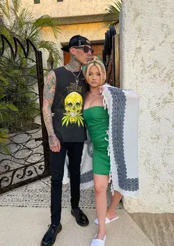 Alabama Barker Shares Photo Holding Travis Barker's Hand