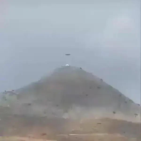 Giant pyramidal UFO abducts something on a hill 😱🛸