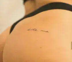 Bite me tattoo
