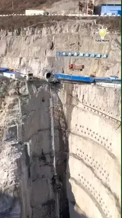 Biggest and deep construction work process - truck being lowered - tube home
