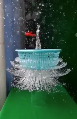 Slow motion video water, ballon burst