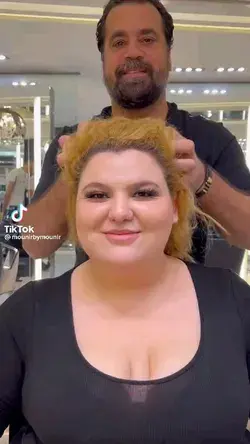 beautiful woman changes her hair color🎨