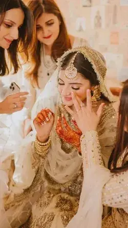 that emotional moment when a bride signs her nikah paper