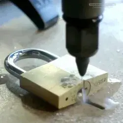 Padlock cut in half with waterjet