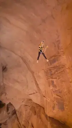 We're obsessed with this insane cliff jump. Just like her, can you hold a camera while doing this?