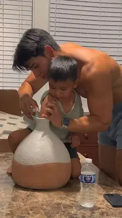 Boy gets his arm stuck in a vase