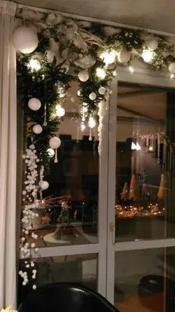 over door swag is easily created with some garland and baubles