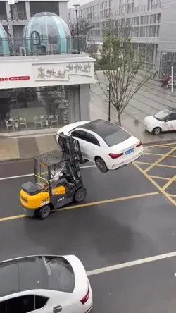 Do you think this damages the car? 😬 Removing illegally parked cars in China.⁠ #SupercarFails