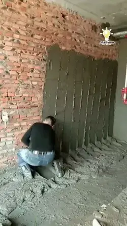 worker fast apply cement plaster on wall - tube home