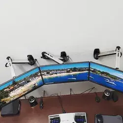 Impressive Triple Monitor Setup by The Handy Guy