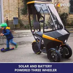 Solar and battery powered three wheeler