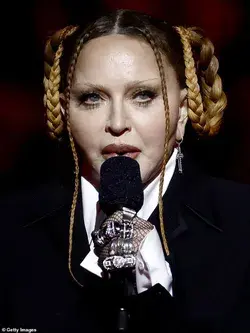 Madonna was "touched" by the slam on her face and the return to a normal look for the Celebration...