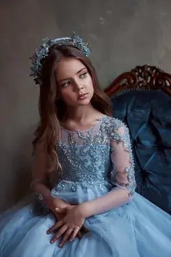 Sky blue dress with a delicate pattern on the bodice and sleeves embroidered with sequins, glass beads and crystal beads. Princess Dress