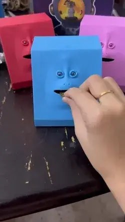 Face coin bank