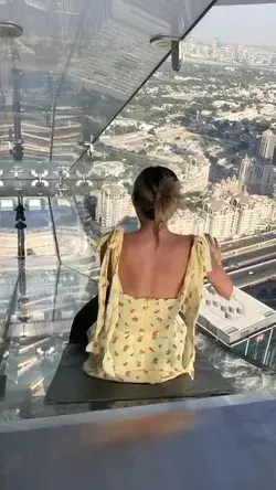 Sliding down from the 53rd floor of a high-rise ensconced within an all-glass capsule at Dubai