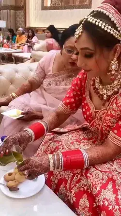 Bride eating Golgappe at the marriage