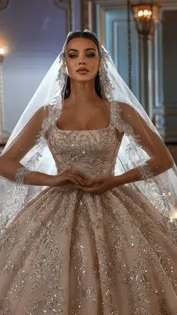 Designer luxurious puffy dress with a long train for a chic bride