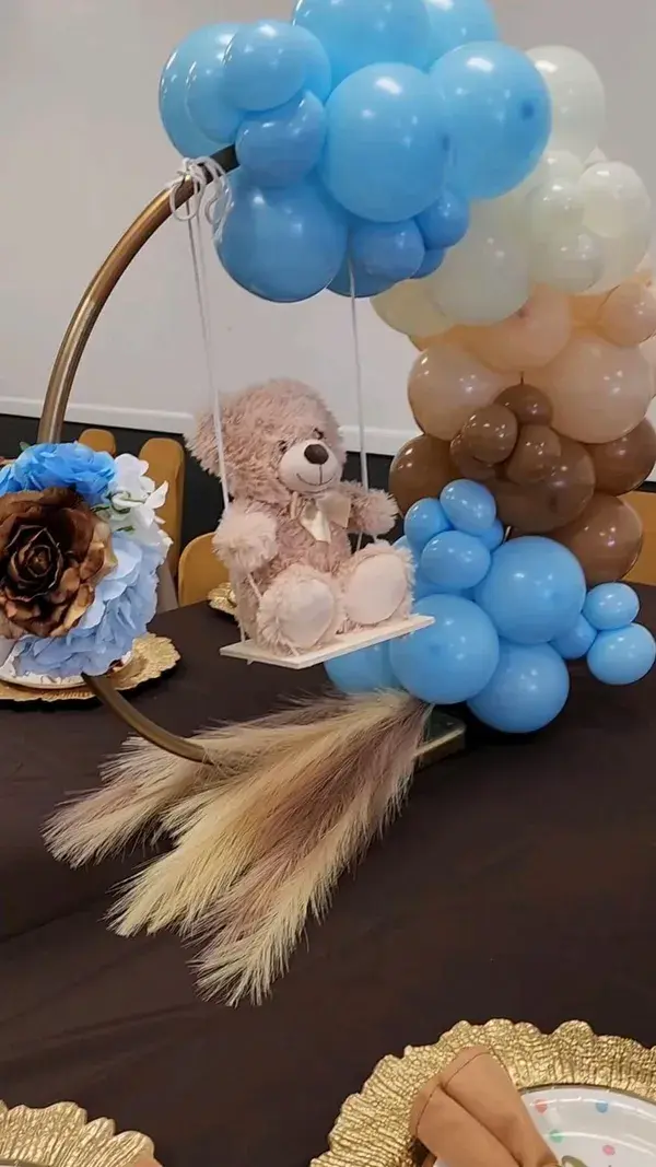 swinging bear table centerpiece