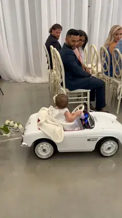 Flower girl wedding entrance with style.