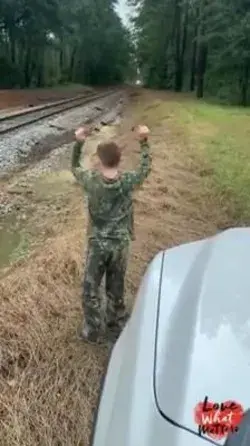 Boy With Down Syndrome And His Train Engineers