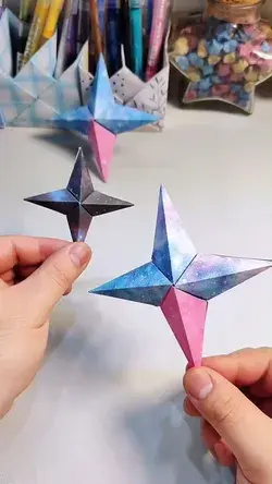 Origami three-dimensional four-pointed star