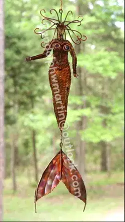 Kinetic copper mermaid.