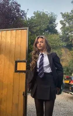 Ava in her new school uniform