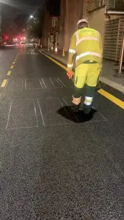 This is how a road marking is painted manually