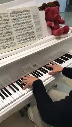 Speedy hands on grand piano 