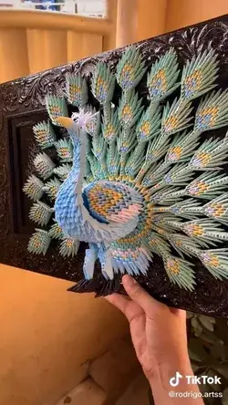 The art of origami. peacock.