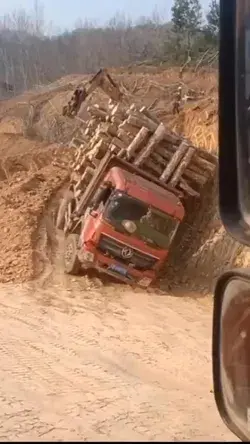 Fearless truck conquers treacherous slope with mighty load!