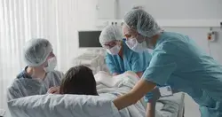 Woman Giving Birth with Husband Stock Footage Video