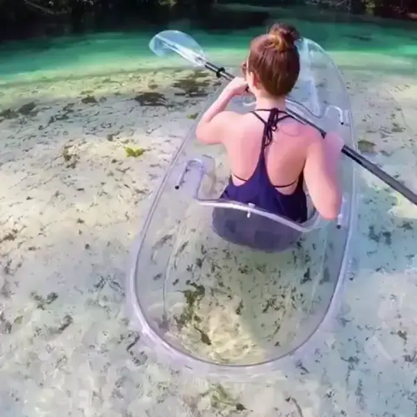 these see-through Kayaks in crystal clear water